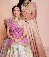 Nita and Isha Ambani Twin in Pastel Anamika Khanna Lehengas for Radhika Merchant's 'Lagan Lakhvanu' Ceremony"